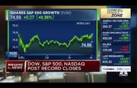Dow jumps 120 points to close just shy of 35,000 on earnings optimism